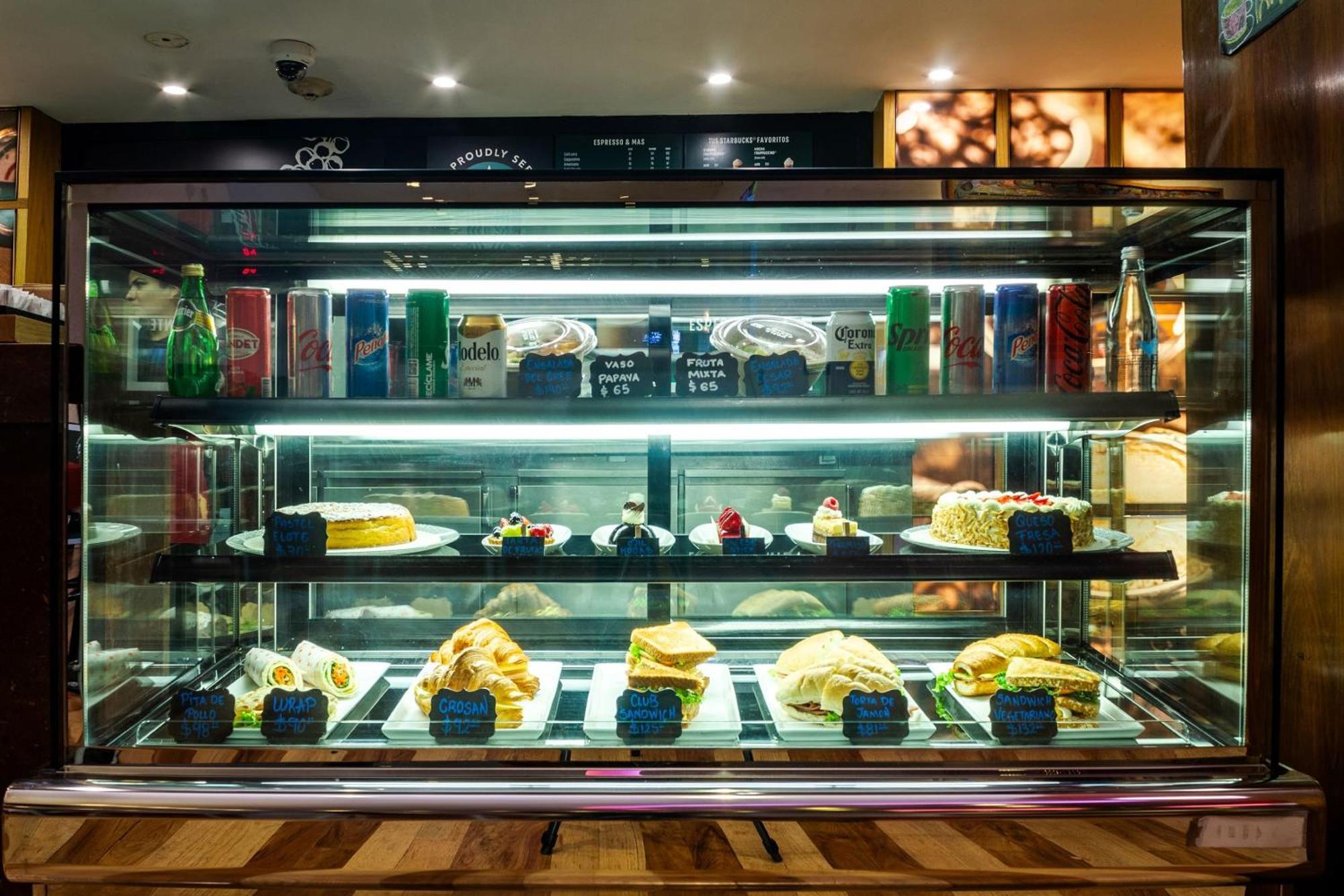 Camino Real Polanco Mexico Hotel Exterior photo A display case of cakes and sandwiches